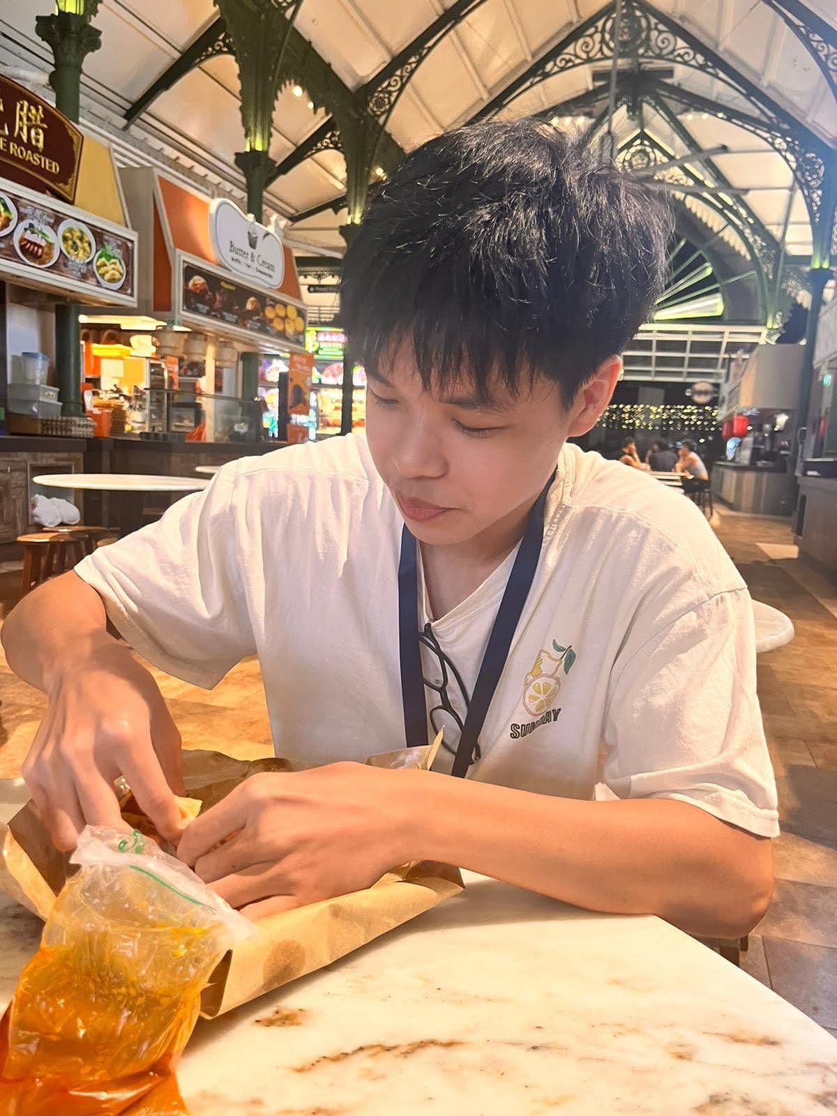 A picture of me eating prata.